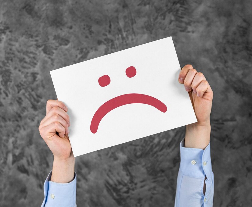 Feuille illustrant un visage mécontent